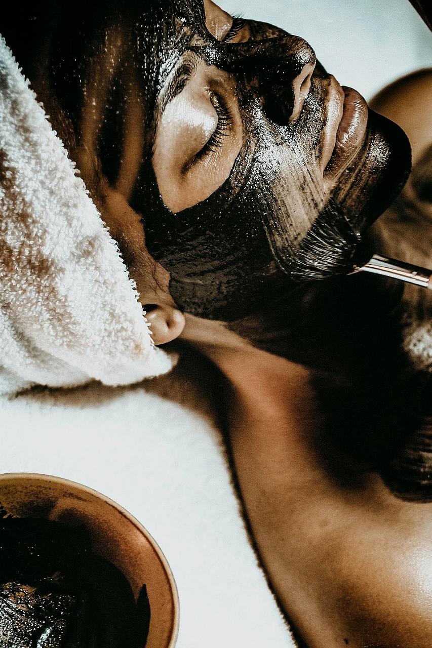Relaxing facial massage with warm herbal compresses
